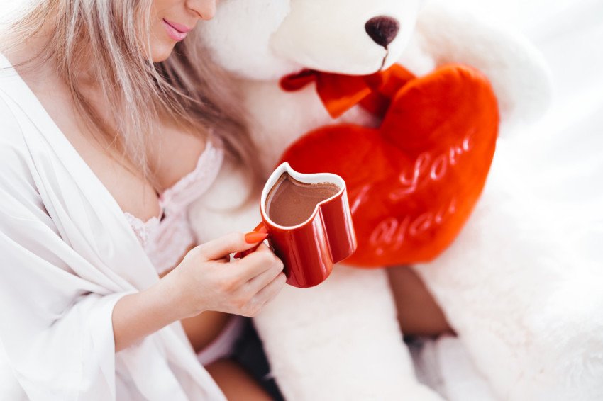 Hot chocolate in a heart shaped cup free photo